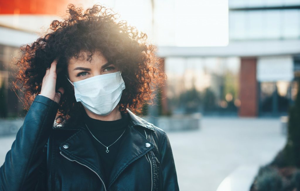 woman wearing surgical mask