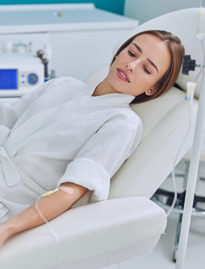 woman receiving iv treatment